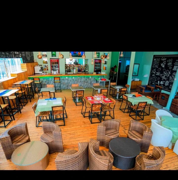 Staff at saba lounge and restaurant at Gisenyi cooking